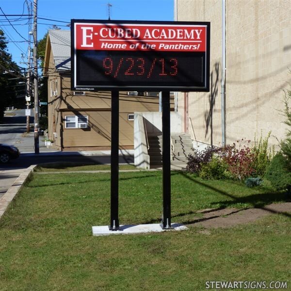 School Sign for E-cubed Academy